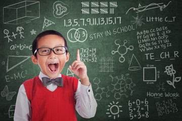 Asian boy student has idea in class