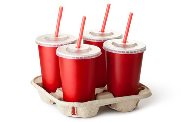 Four red takeout cups in a cup holder - 54026559