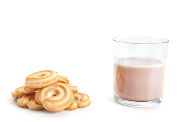 Group of homemade cookies and a cup of warm cacao drink. On a wh