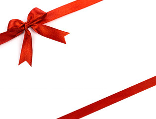 Shiny red ribbon on white background with copy space.