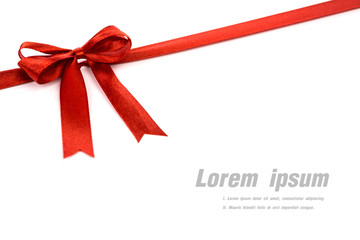Shiny red ribbon on white background with copy space.