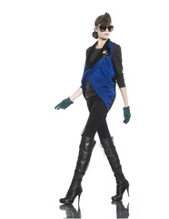 Attractive young fashion model posing in light background