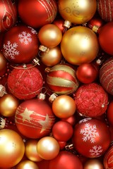 High resolution image of red and golden Christmas ornaments.