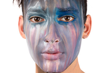 Fototapeta premium Beautiful young man painted on the face