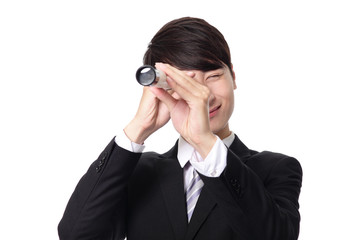 Businessman with telescope looking forward