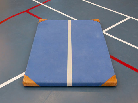 Very Old Blue Mat On A Blue Court