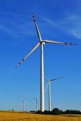 Wind turbines farm. Windmill