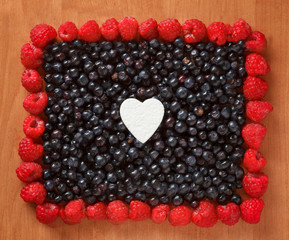 Colorful border frame made of berries