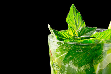Mojito cocktail on black background
