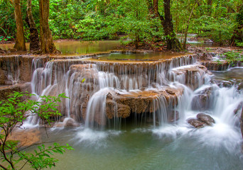 Fototapeta na wymiar Waterfall in deep rain forest jungle (Huay Mae Kamin Waterfall