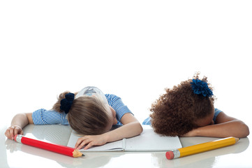 Young kids sleeping in classroom