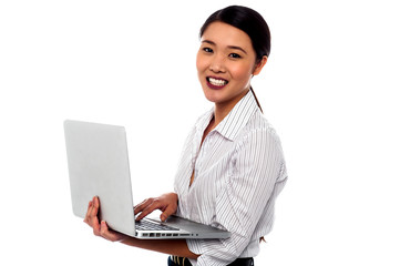 Girl with laptop over white background