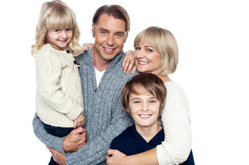 A happy family with children in studio