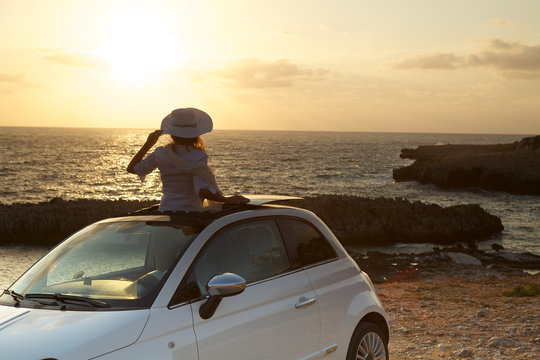 Sunset from a car glass roof .