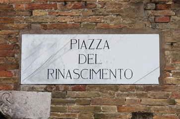 Medieval street sign in Urbino, Italy