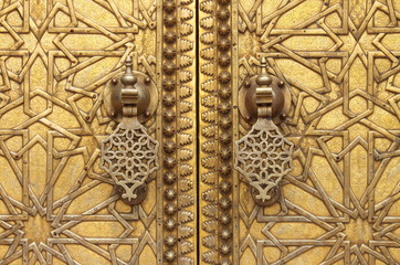 The golden door knockers of the Royal Palace in Fes, Morocco