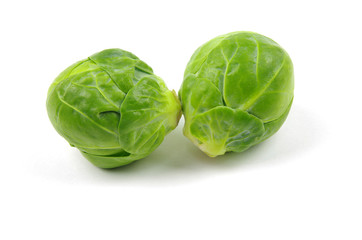 Fototapeta premium two Brussel sprouts on a white background
