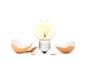Innovation Bright Ideas Light Bulb Hatching From Egg Shell - obrazy, fototapety, plakaty