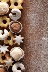 Christmas cookies on wooden background with copy space.