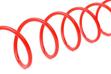 Plastic spring isolated on a white background