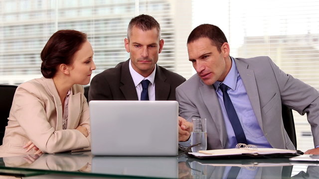 Business people working together a laptop