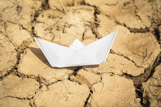 Paper boat  on dry land