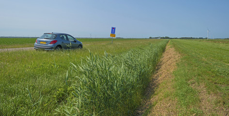 Car parked along a countryside road