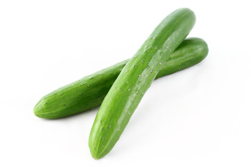 Japanese cucumber are stacked isolated on white background