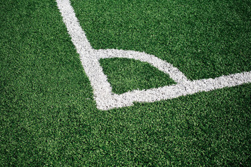 White stripe on the green soccer field from top view