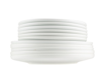 Obraz premium Pile of clean white dish plates isolated