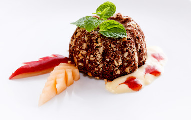 Tasty chocolate brownies with almonds and fruits.