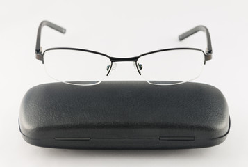 Black glasses on white background