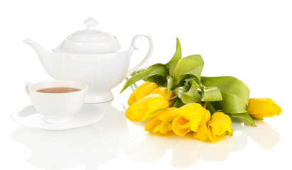 Tea set and tulips isolated on white