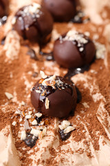 Chocolate candies with nuts, close up