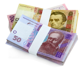 Pile of Ukrainian money, isolated on white