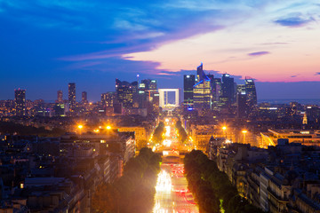 La Defense and Champs-Elysees at sunset in Paris, France.