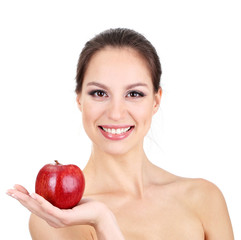 Smiling woman with apple isolated on white