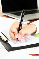 Close up of businesswoman hands during work