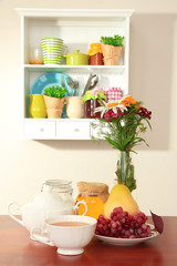 Kitchen composition on table on shelf background