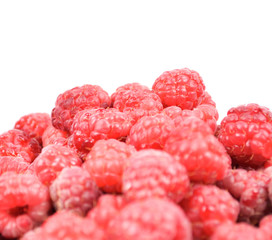 Pile of fresh juicy raspberries isolated on white