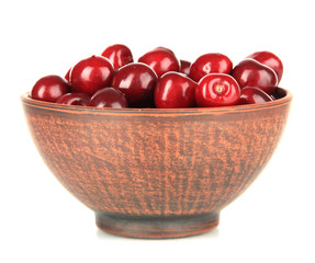Cherry berries in bowl isolated on white