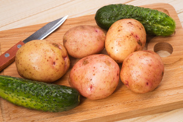 Fresh potatoes and cucumbers