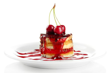 Tasty biscuit cake with jam and berries