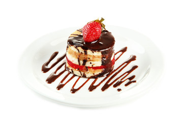 Tasty biscuit cake with chocolate and berry