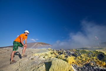 hiker on volcano - 54057336