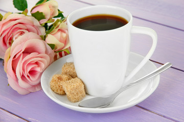 Cup of coffee, on color wooden background