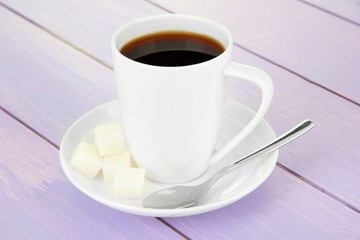 Cup of coffee, on color wooden background
