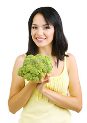 Girl with fresh broccoli isolated on white