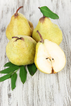 Pears on wooden background