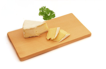 moldy cheese on the wooden cutting board